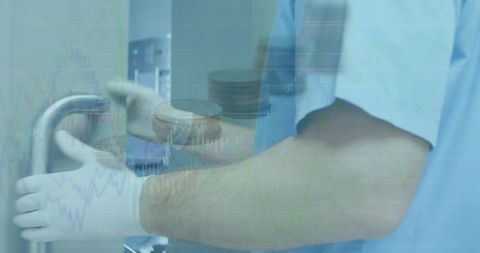 Healthcare costs: doctor walking hallway amid financial graphs