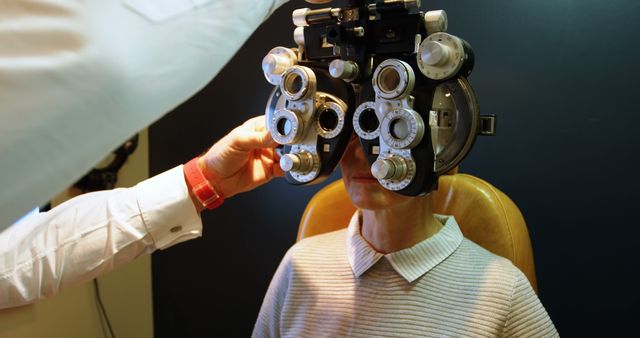 Eye Examination Using Phoropter for Vision Test at Optometrist Clinic - Download Free Stock Images Pikwizard.com