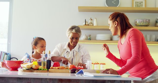 Multi-Generational Family Cooking Together in Bright Kitchen - Download Free Stock Images Pikwizard.com