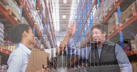 Warehouse Team High-Fiving Over Inventory Charts Showing Productivity Growth and Efficiency