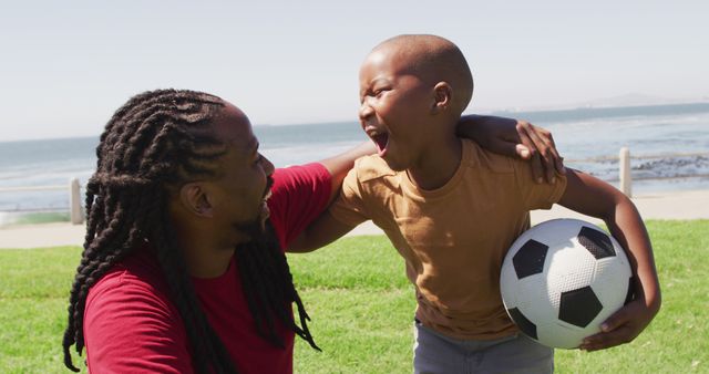 Happy African American Father and Son Bonding at the Beach - Download Free Stock Images Pikwizard.com