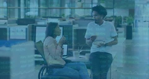 Coworkers discussing data over coffee in modern open office with financial overlay