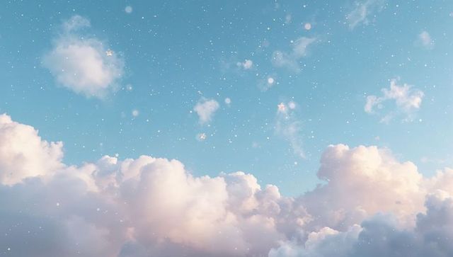 Drifting cumulus clouds glowing in pastel dawn sky with sparkling light particles