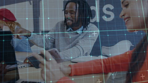 Diverse Team Engaged in Technology and Collaboration