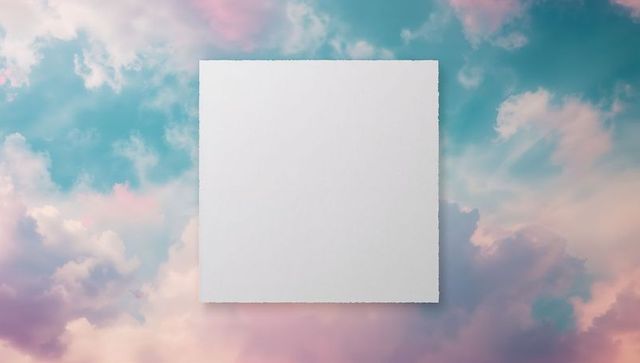 Floating blank sheet with torn edges against pastel cloudscape