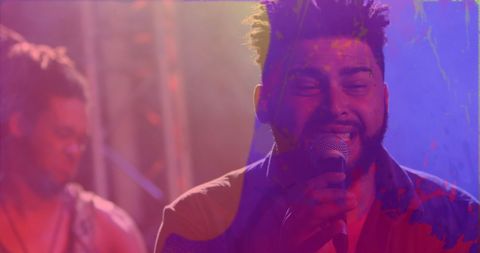 Energetic Live Music Performance with Colorful Visual Effects - Download Free Stock Images Pikwizard.com