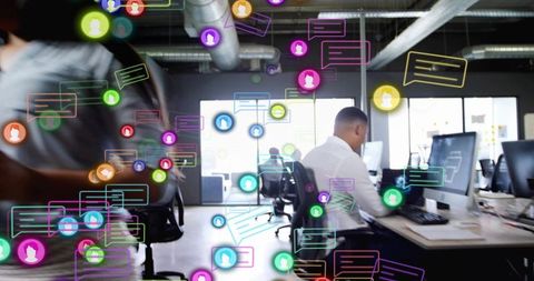 Open plan office boosting communication with floating chat icons