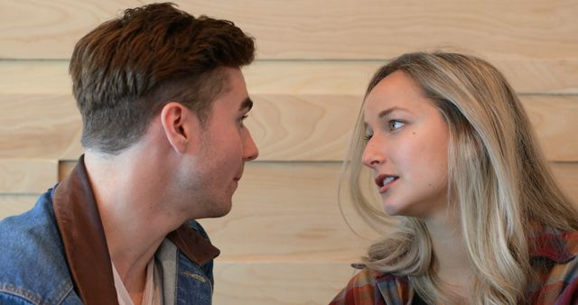 Young romantic couple interacting with each other in cafe. Smiling happy couple 4k