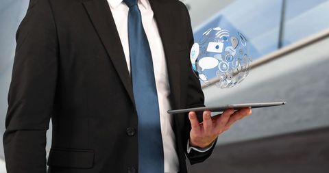 Businessman Innovatively Managing Digital Networking with Tablet - Download Free Stock Images Pikwizard.com