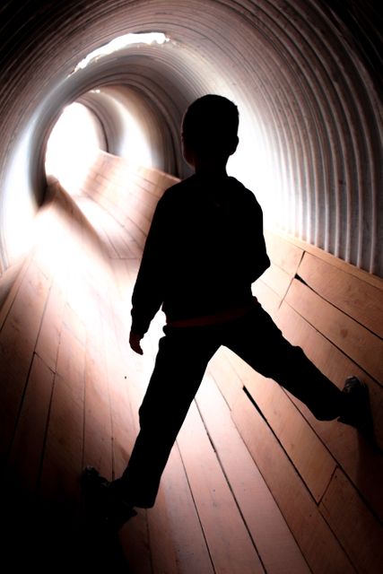 Child climbing light tunnel - Download Free Stock Photos Pikwizard.com