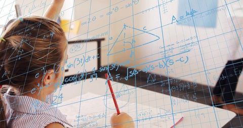 Elementary girl solving math problems at desk with handwritten algebra and geometry formulas