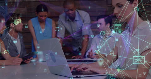 Diverse Team Collaborating in Digital Networked Office