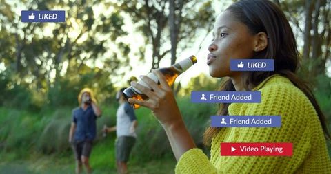 Woman Connecting with Friends in Nature Over Drinks