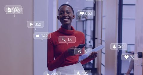 African American Businesswoman Engaged in Social Media Interaction