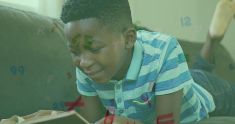 Boy Immersed in Reading with Educational Overlays