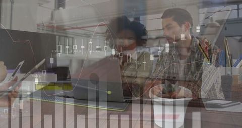 Diverse Team Analyzing Financial Technology in Modern Office - Download Free Stock Images Pikwizard.com