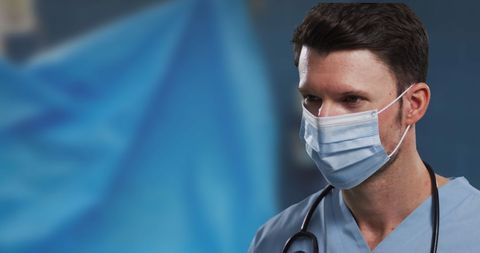Male Nurse Wearing Mask Standing in Hospital - Download Free Stock Images Pikwizard.com