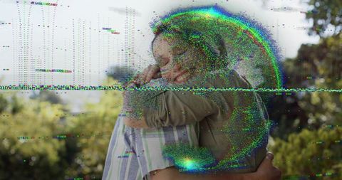 Glitchy romance: mature couple embracing in garden with pixel noise overlay