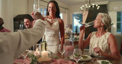 Bride delivering heartfelt speech at elegant wedding dinner