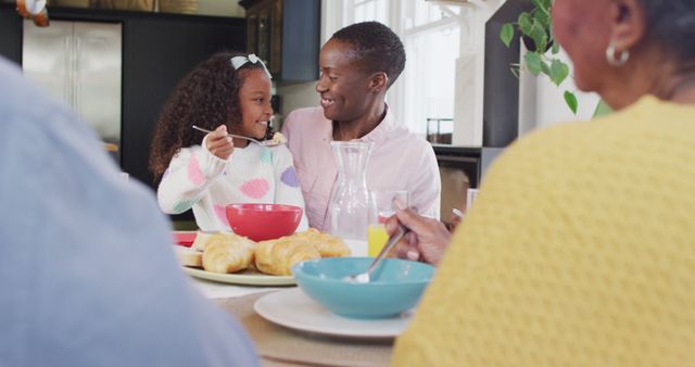 Family Sharing Breakfast Together in Cozy Kitchen - Download Free Stock Images Pikwizard.com