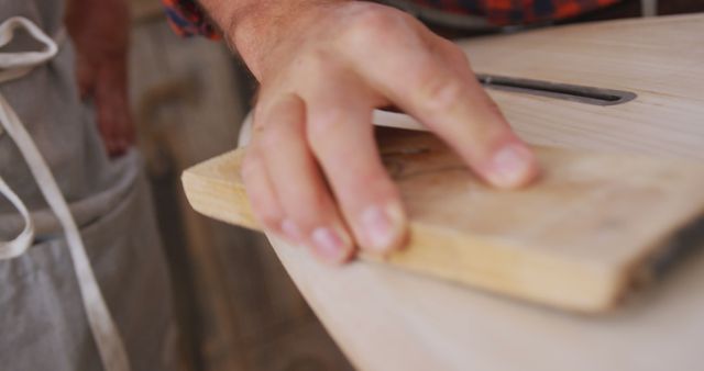 Carpenter's Hand Sanding Wood in Workshop, Close-up - Download Free Stock Images Pikwizard.com