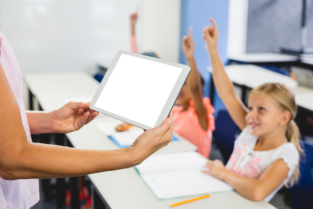 Transparent tablet display in hands of teacher in active classroom - Download Free Stock Videos Pikwizard.com