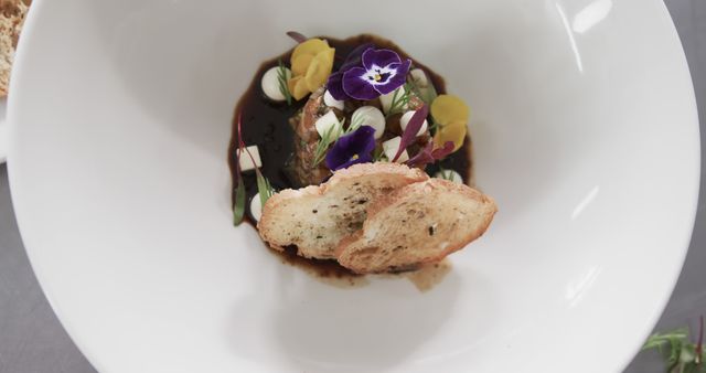Gourmet Dish with Edible Flowers and Bread Garnish in Elegantly White Plate - Download Free Stock Images Pikwizard.com