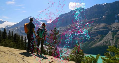 Hikers enjoying breathtaking mountain lake view