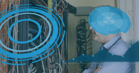 IT Specialist Analyzing Server Data with Digital Overlay Graphics