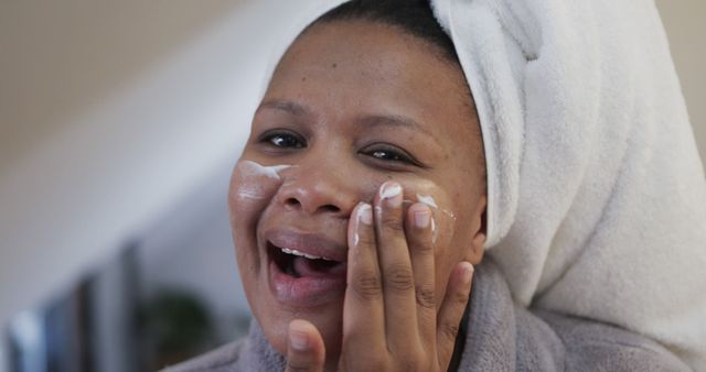 Black Woman Applying Skincare Cream Laughing - Download Free Stock Images Pikwizard.com