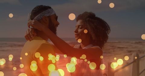 Romantic African American Couple Embracing on Sunlit Beach - Download Free Stock Images Pikwizard.com