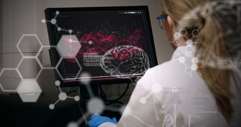 Scientist Analyzing Brain Data on Computer with Digital Graphics - Download Free Stock Images Pikwizard.com