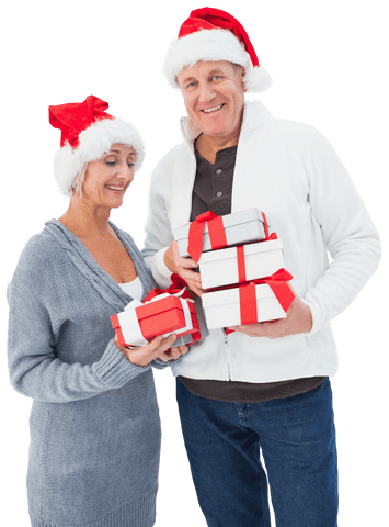 happy mature couple holding christmas gifts transparent background - Download Free Stock Videos Pikwizard.com