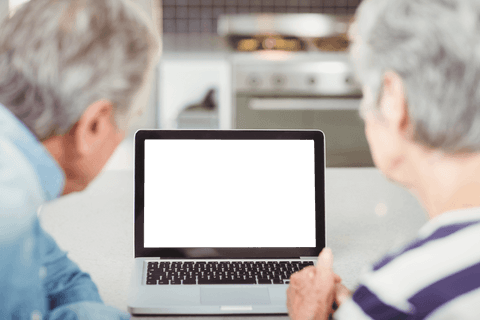 senior couple at home using laptop with transparent screen - Download Free Stock Videos Pikwizard.com