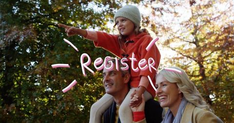 Family walking in autumn park with daughter on shoulders pointing and smiling, register