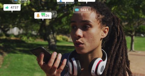 Woman Engaging with Social Media Notifications Outdoors