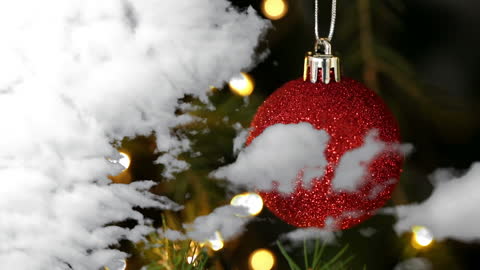 Festive Red Ornament with Snowy Cloud Overlay