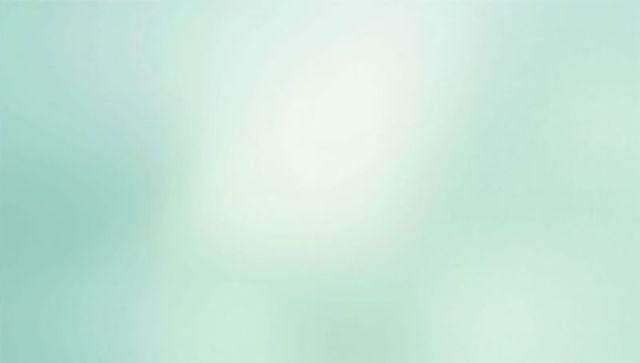 Glowing mint-teal gradient radiating soft circular bokeh with feathered pastel glow