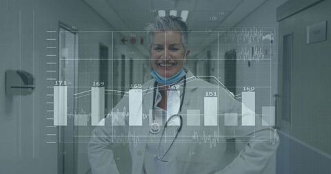 Confident Senior Doctor Overlaid with Graphs in Hospital Corridor