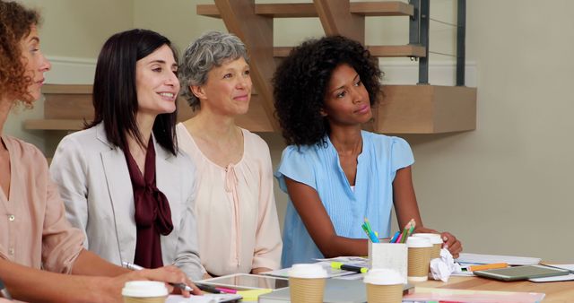 Diverse Women Engaging in Business Meeting at Modern Office - Download Free Stock Images Pikwizard.com