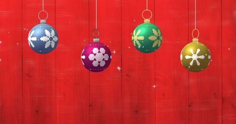 Colorful Christmas Ornaments on Vibrant Red Background - Download Free Stock Images Pikwizard.com