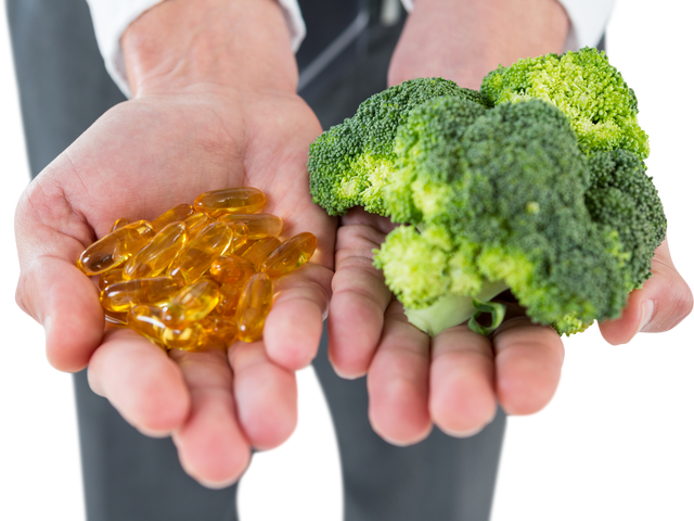 Transparent Image Showing Hands Holding Broccoli and Vitamin Pills - Download Free Stock Videos Pikwizard.com