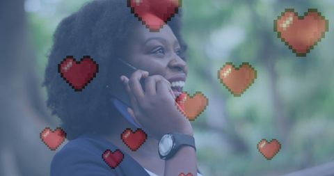 Joyful African American Woman Talking on Phone with Heart Icons