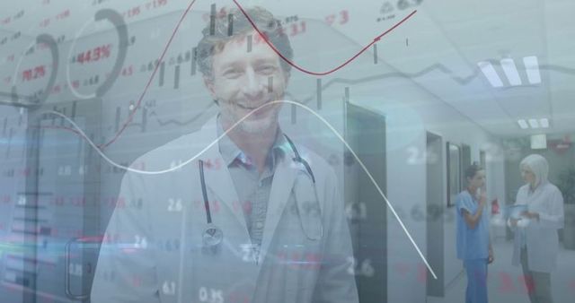 Smiling Male Doctor Analyzing Medical Data Graphs in Hospital Corridor