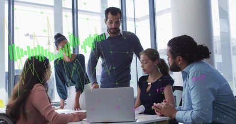 Business Team Collaborating with Data Visualizations