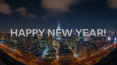 Celebrating New Year Over Night Skyline With Illuminated Spire and Floating Text