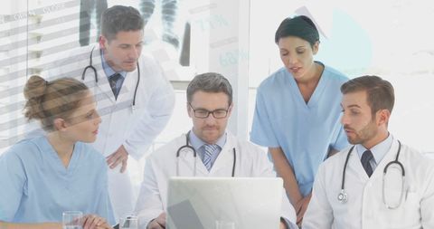 Multicultural Doctors Using Laptop with Overlay of Medical Data - Download Free Stock Images Pikwizard.com