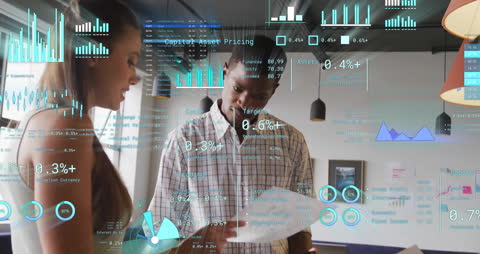 Diverse Professionals Analyzing Data in Modern Office with Digital Graphics