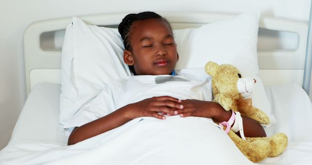 African American Girl Resting in Hospital Bed with Teddy Bear - Download Free Stock Images Pikwizard.com