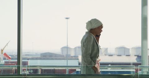 Young Woman Discussing Travel Plans at the Airport